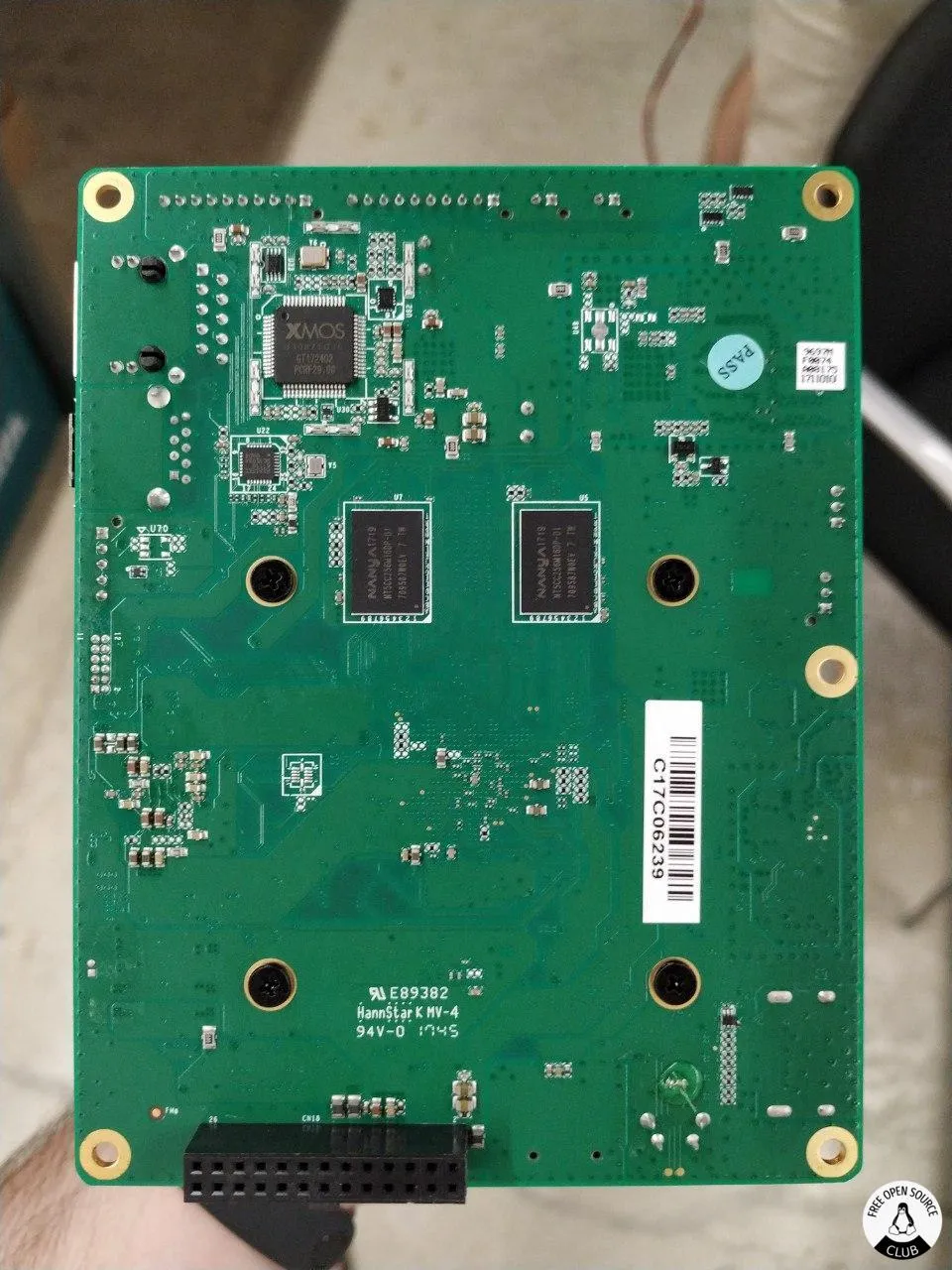 Atomic Pi undersite vieded head on. XMOS audio processing chip visible up top, plus two ram chip near the SoC